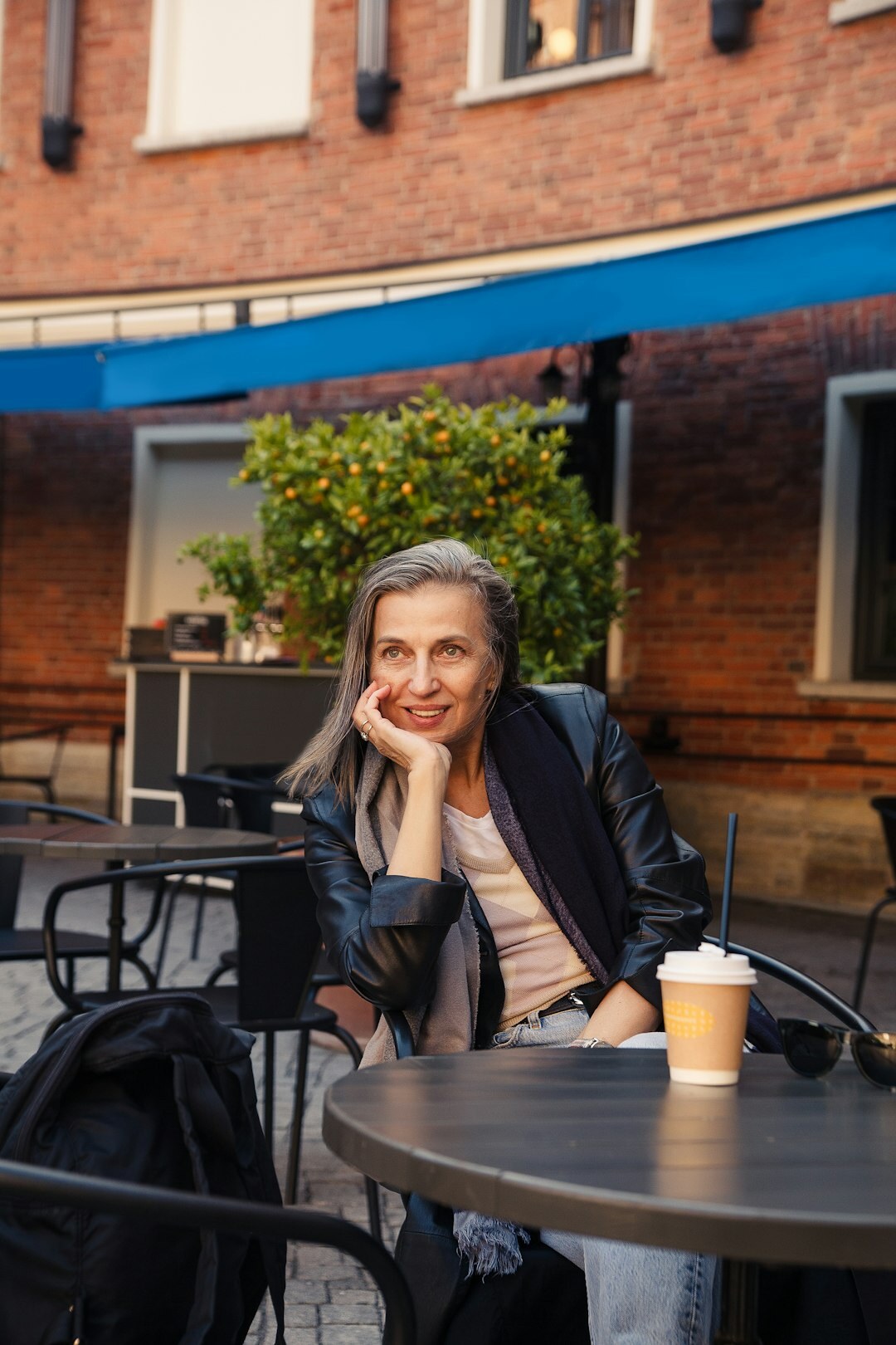 Portrait of a European woman journalist in her forties