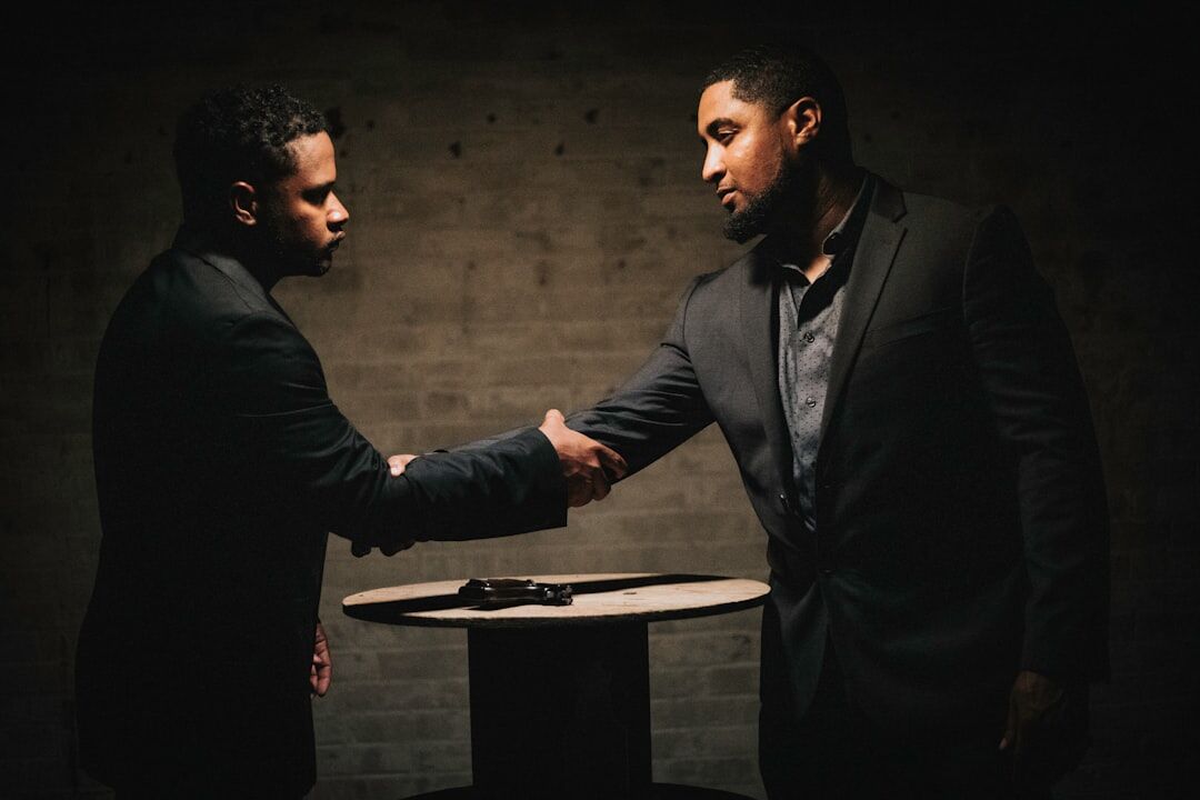 handshake between rivals