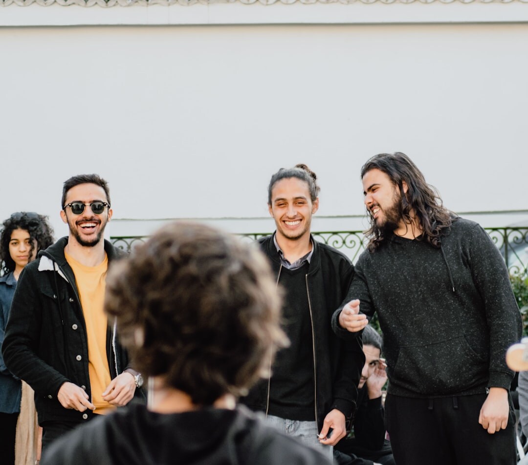 group of celebrities laughing